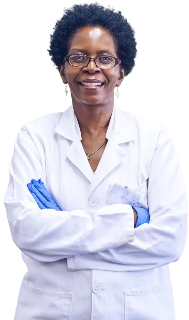 A female scientist in a lab coat and gloves, engaged in research within a laboratory environment.